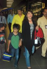 Madhuri Dixit snapped with kids and husband at the airport in Mumbai on 1st Jan 2012 (7).JPG